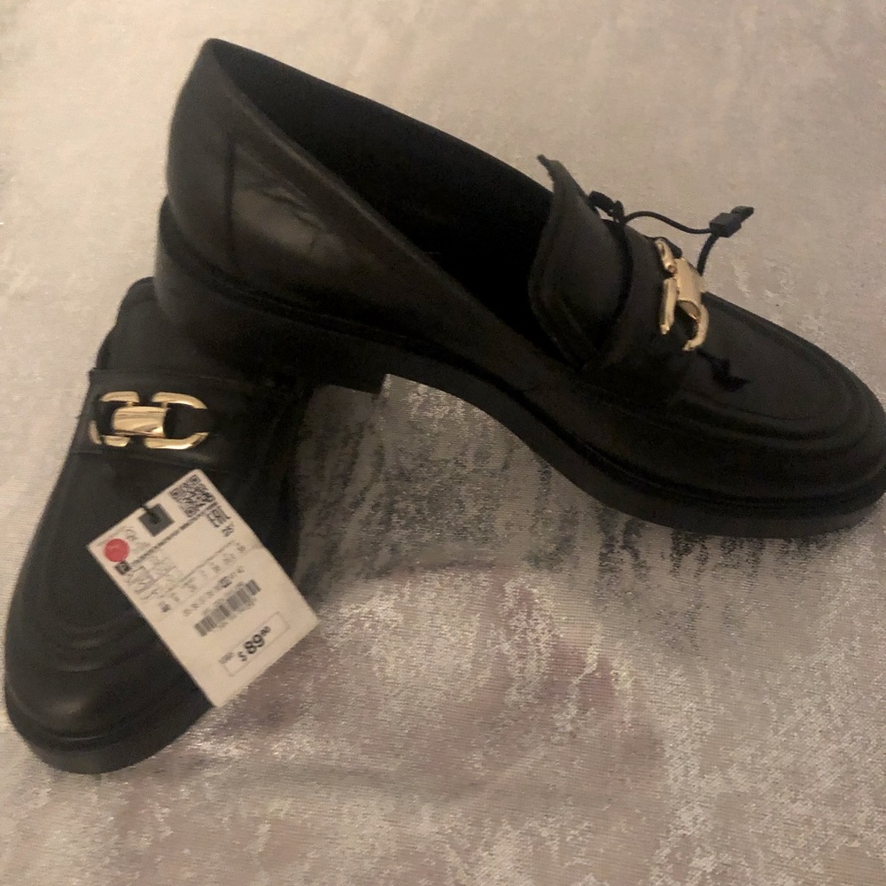 Women’s Zara’s all leather black loafers. Size 9